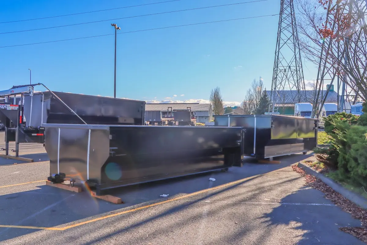 Roll-off dumpster ready for waste disposal at job site for 2 Yard Dumpster Rental in Woodlawn